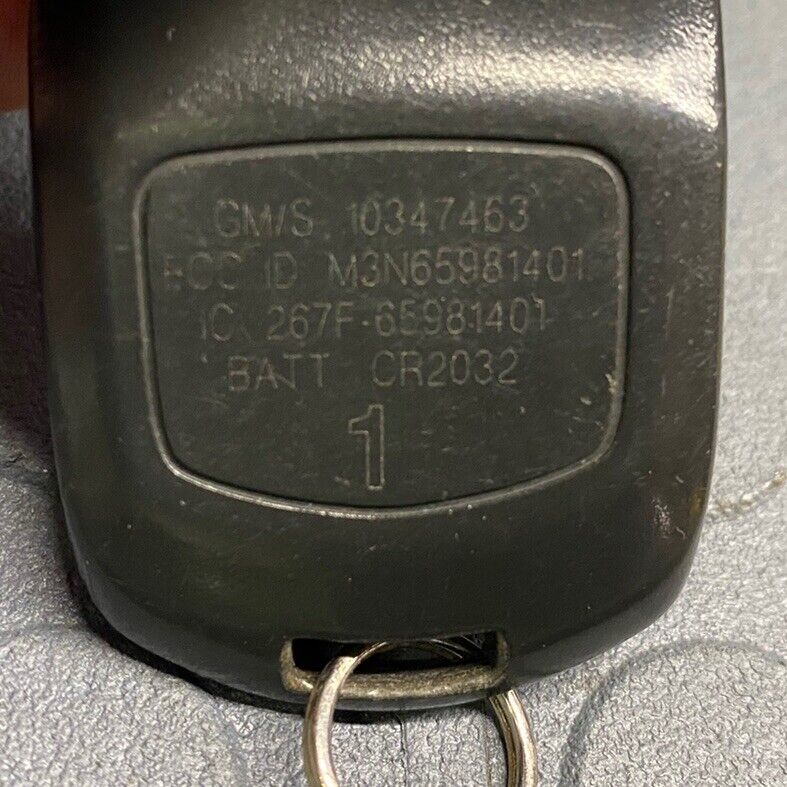 OEM CADILLAC XLR KEYLESS REMOTE FOB TRANSMITTER #1 10347463