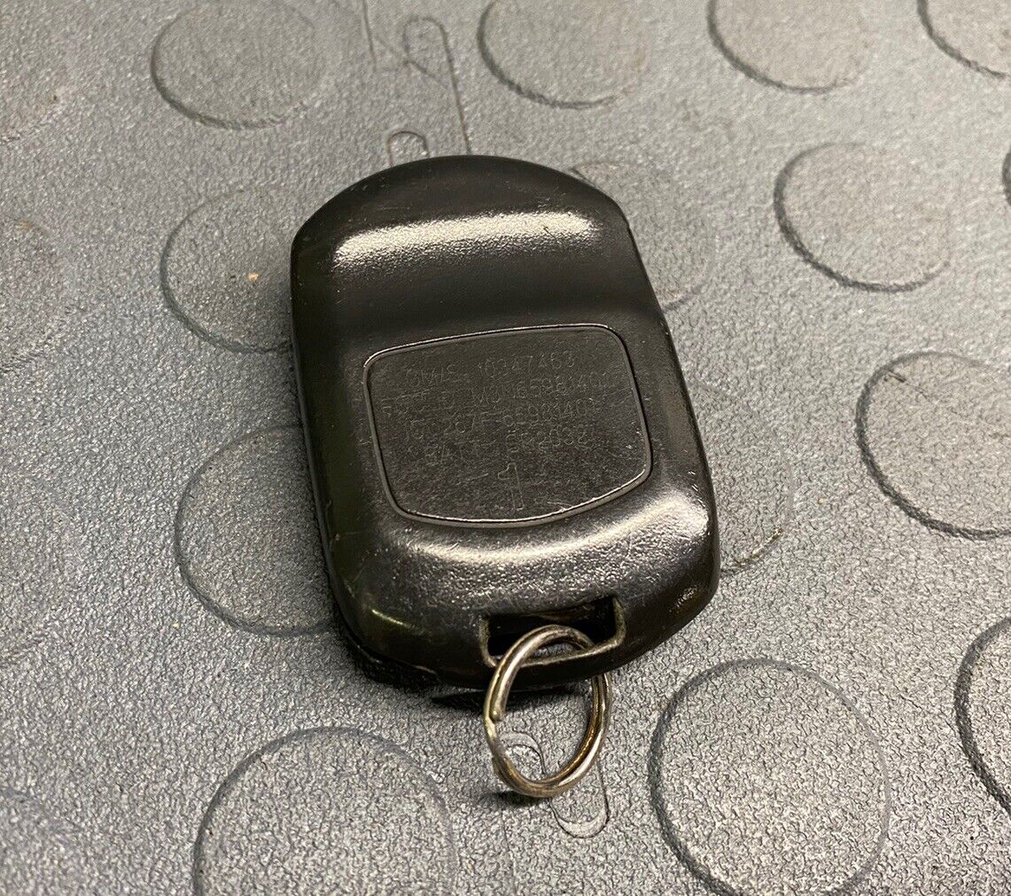 OEM CADILLAC XLR KEYLESS REMOTE FOB TRANSMITTER #1 10347463