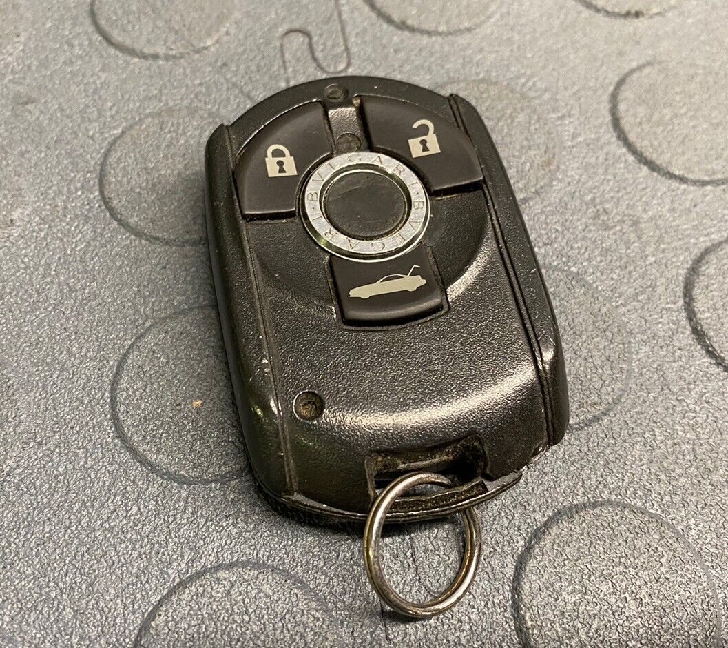 OEM CADILLAC XLR KEYLESS REMOTE FOB TRANSMITTER #1 10347463