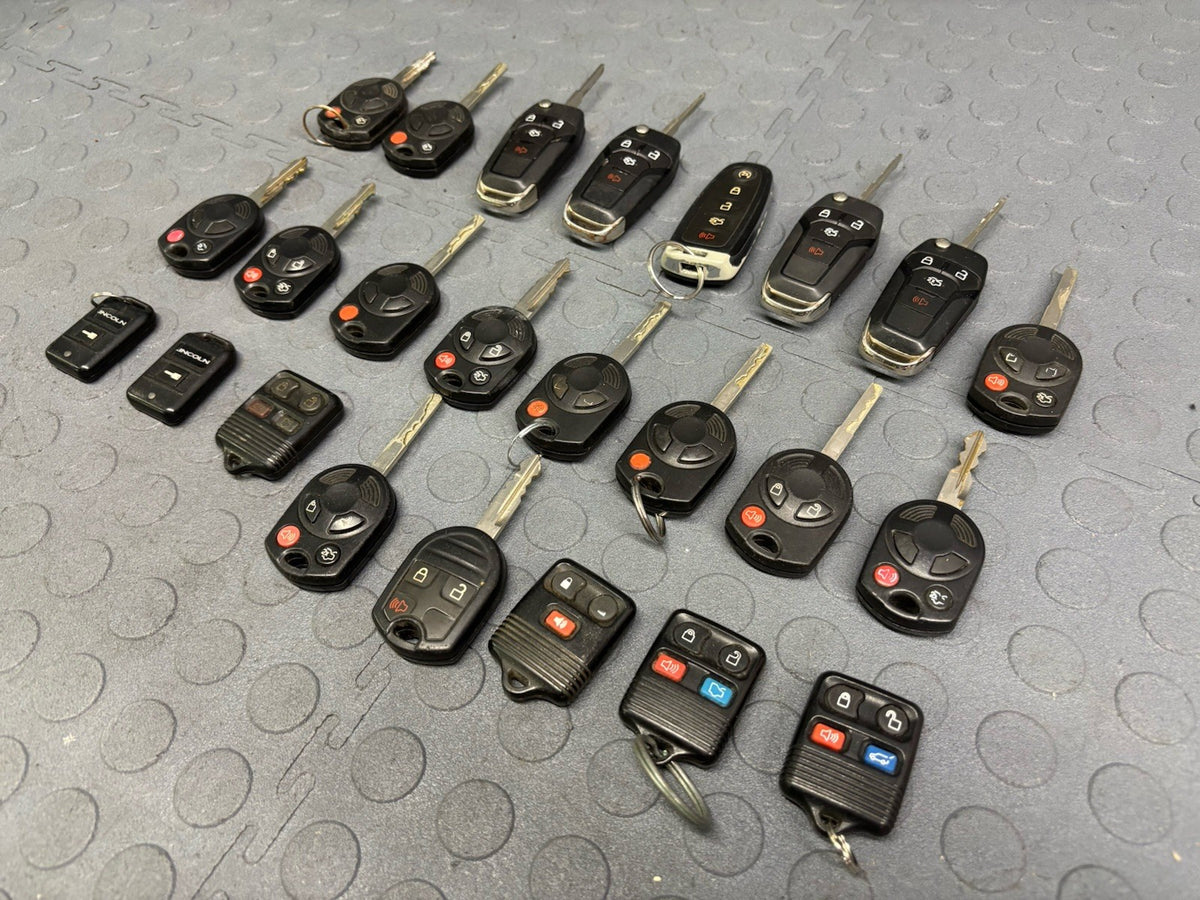 Wholesale LOT of 24 Ford Keyless Entry Remote Remotes Fob Fobs Locksmith
